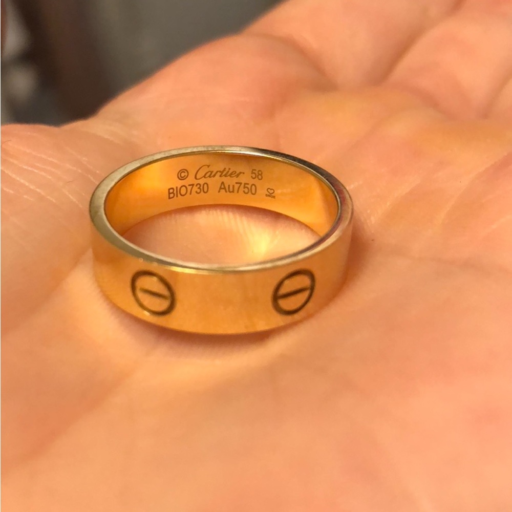 18k gold Cartier love ring. Purchased at Cartier in downtown Toronto.